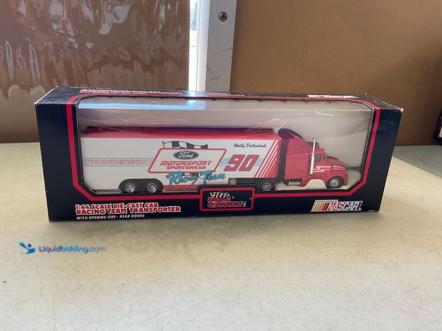 Lot 49-1971409 - Other NASCAR RACING CHAMPIONS 1/64 SCALE DIECAST CAB RACING TEAM TRANSPORTER #90 WALLY DALLENBACH FO...