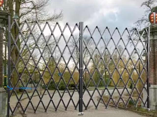 Lot 49-1517183 - VEVOR
Folding Security Gate 5 ft. H x 10.16 ft. W Steel Accordion Folding Door Gate with Keys Barri...