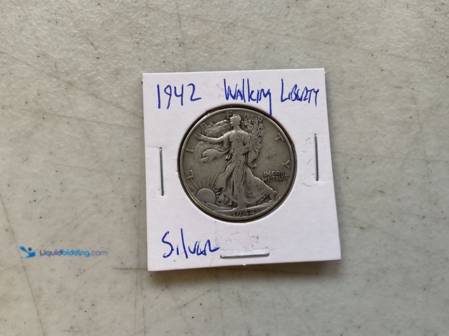 Lot 49-1505233 - 1942 WALKING LIBERTY HALF DOLLAR COIN 90% SILVER #COINS1211