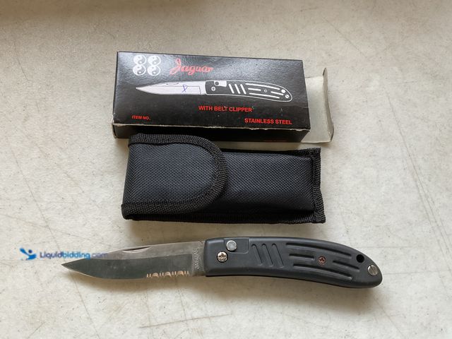 Lot 49-5515588 - Other JAGUAR STAINLESS STEEL BLADE POCKET KNIFE WITH BELT CLIPPER FLIP OPEN WITH LOCK BUTTON NEW IN ...
