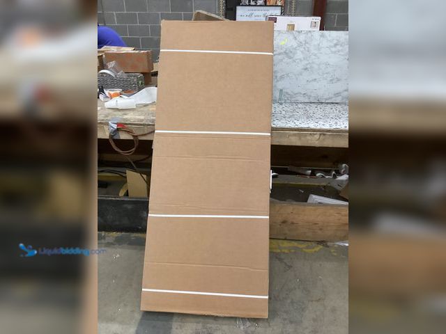 Lot 49-5460838 - Greenwich Verona White Laundry Cabinet. Item is Unused