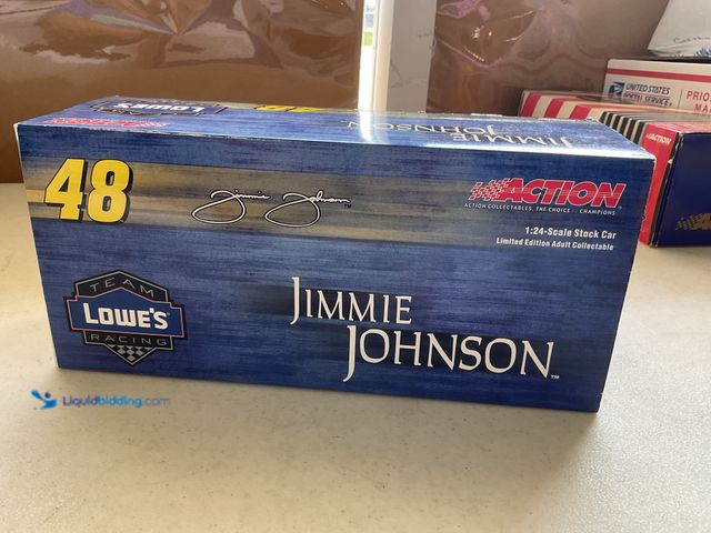 Lot 49-5341556 - ACTION RACING #48 JIMMIE JOHNSON LOWES 1/24 SCALE DIECAST CAR IN ORIGINAL BOX