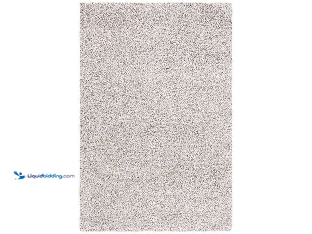 Lot 49-5408401 - SAFAVIEH Berber 8 ft. x 10 ft. Ivory/Brown Abstract Speckled Area Rug. [Model # BRB101T-8] Unused