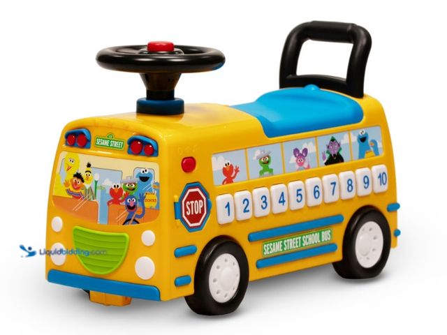 Lot 49-5538921 - Sesame Street School Bus Ride-On With Lights And Horn. Unused