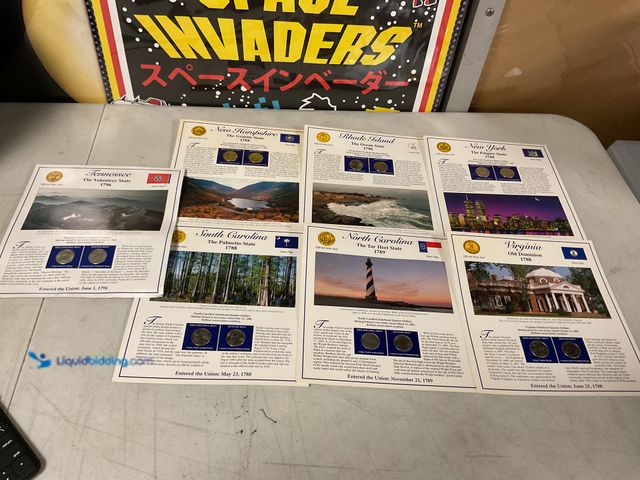 Lot 49-1505406 - LOT OF 7 STATEHOOD QUARTER AND STAMP SETS INCLUDING TENNESSEE, NEW HAMPSHIRE, RHODE ISLAND, NEW YORK...