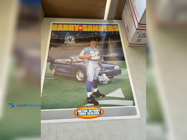 Lot 49-3503986 - 1994 DETROIT LIONS BARRY SANDERS METRO DETROIT FORD DEALERS PROMO POSTER WITH FACSIMILE AUTOGRAPH