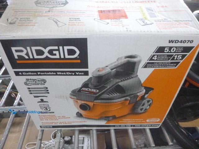 Lot 49-1514876 - RIDGID 4 Gal. 5.0 Peak HP Portable Shop Vacuum WD4070 Wet Dry Vac with Fine Dust Filter, Locking Hos...