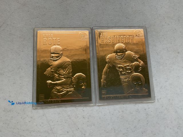 Lot 49-1804516 - 2 NFL FOOTBALL 22K GOLD FOIL CARDS.