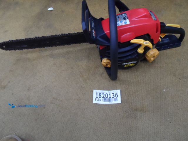 Lot 49-1820136 - 1 Homelite UT10589A Gas Powered Chainsaw Homelite 18" Gas Powered Chainsaw Used In Rough Condition, ...