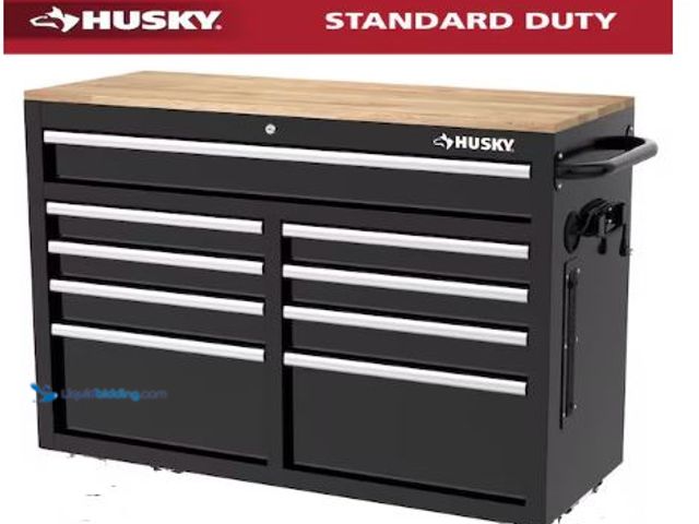 Lot 49-1569282 - Husky Tool Storage 46 in. W x 18 in. D 9-Drawer Mobile Workbench Cabinet in Gloss Black, Model # H46...