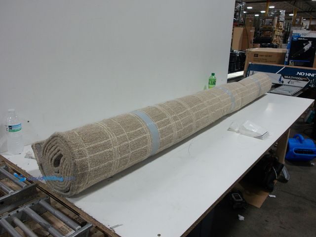 Lot 49-2025479 - Grid-Patterned Area Rug, 9.8 ft. x 7.9 ft., Beige/Tan, Slightly used.   Ref#WAL0909