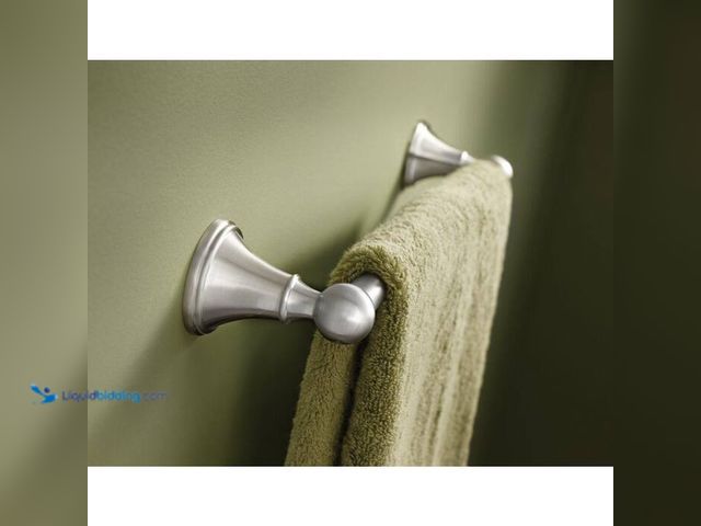 Lot 49-1517289 - Delta Crestfield 24 in. Wall Mounted Towel Bar in Brushed Nickel. Model# 138031. Slightly Used. Miss...