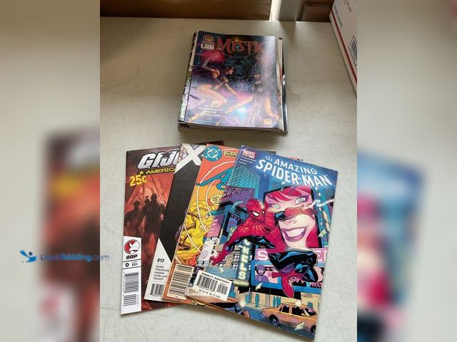 Lot 49-5350264 - LOT OF 20 COLLECTIBLE COMIC BOOKS FROM DC, MARVEL AND MORE INCLUDING SPIDER-MAN, AVENGERS, X-MEN, GI...