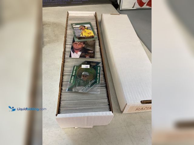 Lot 49-1505541 - COLLECTIBLE LIDDED BOX FULL OF VARIOUS NASCAR SPORT CARDS LOADED WITH GREAT CARDS FOR ANY COLLECTOR!...