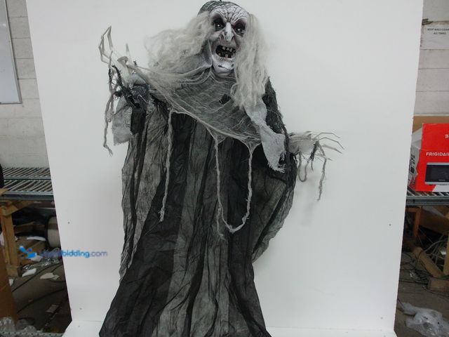 Lot 49-1558929 - Hanging Whitch Halloween Decoration with Sound and LED Lights, Slightly used.  Ref#BLUEAMA1203