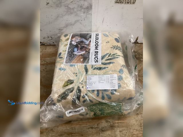 Lot 49-3528747 - Yellow flower  area rug. Item is unused.