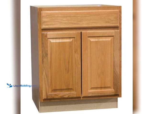 Lot 49-1564321 - Hampton Bay Hampton 27 in. W x 24 in. D x 34.5 in. H Assembled Base Cabinet in Medium Oak Model # KB...