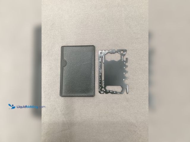 Lot 49-910880 - New Stainless Steel Credit Card Multi-Tool AKA "46 in 1" survival tool. It includes functional tools...