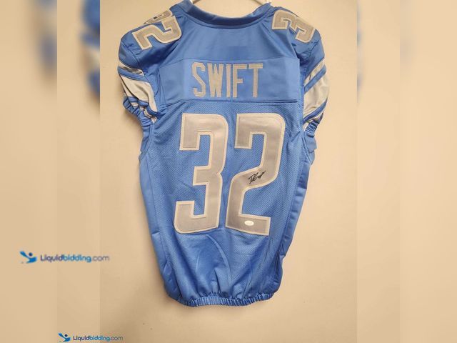 Lot 49-1804655 - 1 DETROIT LIONS FORMER STAR RUNNING BACK D'ANDRE SWIFT AUTOGRAPHED JERSEY