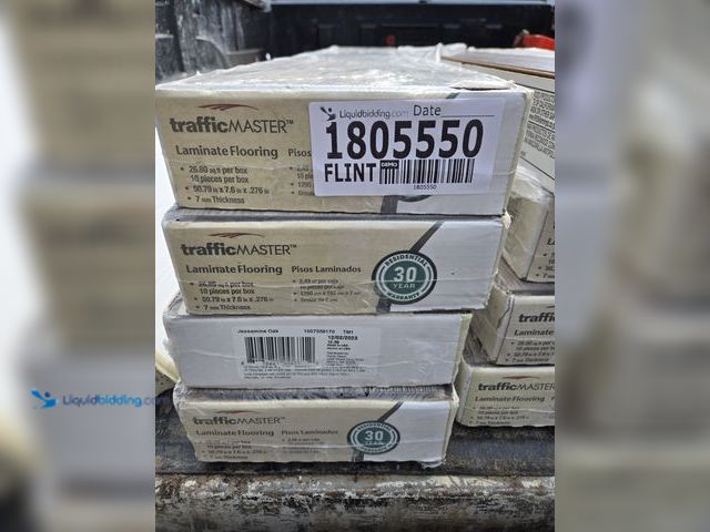 Lot 49-1805550 - 15 boxes Approx 455 sq. Ft. Laminate flooring Traffic Master golden oak.