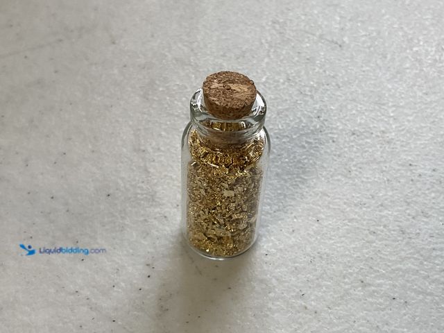 Lot 49-3503511 - RARE ONE INCH GLASS VILE OF PURE 24K GOLD FLAKES