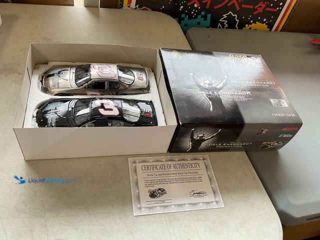 Lot 49-1505750 - COLLECTIBLE ACTION RACING NASCAR #3 DALE EARNHARDT FOUNDATION SET OF 2 1/24 SCALE DIECAST CARS IN OR...