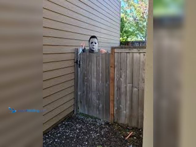 Lot 49-5436567 - Michael Myers fence creeper. Halloween decoration. Unused.