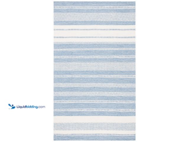 Lot 49-5416219 - SAFAVIEH Striped Kilim Ivory Blue 8 ft. x 10 ft. Chevron Striped Area Rug. [Model # STK503A-8] Used