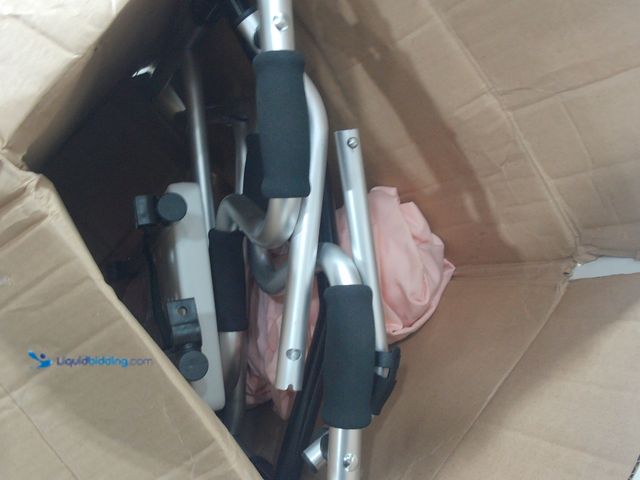 Lot 49-2024629 - White and black travel Shower chair. Used. Has attachments. Unable to test. Scuffs and scratches.   ...