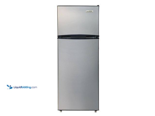 Lot 49-5538806 - Frigidaire
7.5 cu. ft. Mini Refrigerator with Top Freezer in Stainless Look Unused, dented on right...