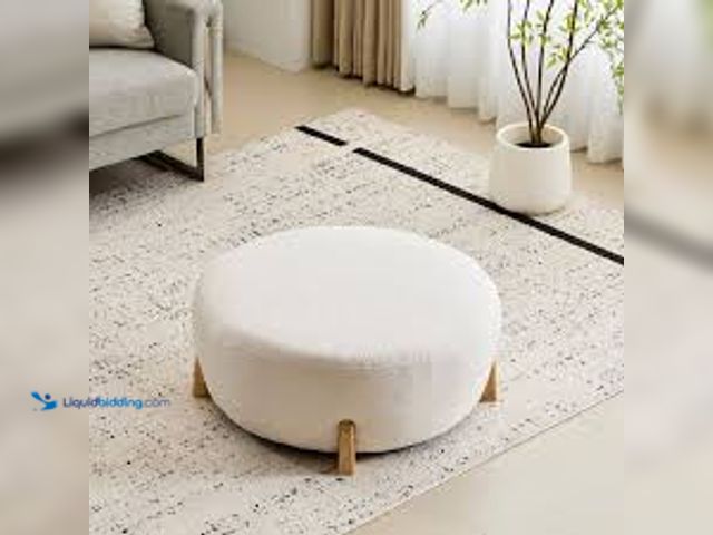 Lot 49-3539304 - Harper & Bright Designs White Modern Boucle Fabric Top Round Medium Ottoman with Splayed Rubber Wood...