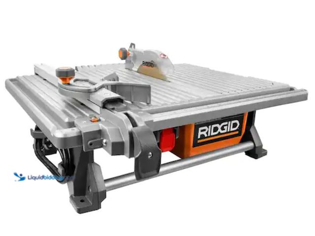 Lot 49-3614019 - RIDGID 6.5-Amp 7 in. Blade Corded Table Top Wet Tile Saw, Model # R4021, Used, Has attachments, Scuf...