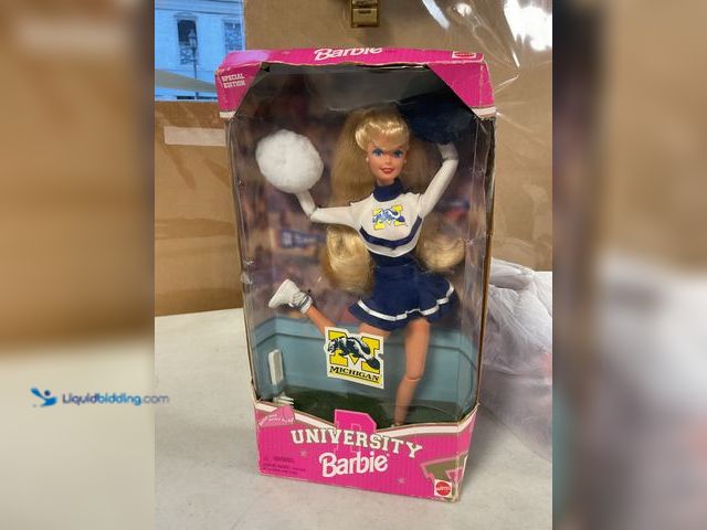 Lot 49-1811322 - COLLECTIBLE 1996 UNIVERSITY OF MICHIGAN BARBIE BY MATTEL