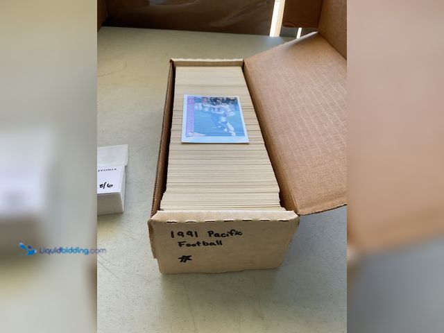 Lot 49-3503810 - 1991 PACIFIC FOOTBALL COMPLETE 550 CARD SET INCLUDING DEION SANDERS AND MORE