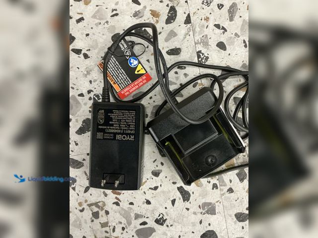 Lot 49-3564698 - Ryobi OY25421 Battery Charger, Unused.