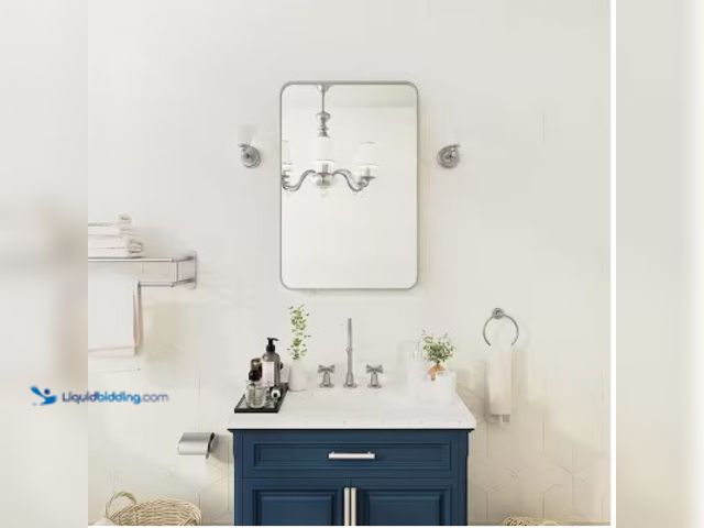 Lot 49-2004684 - TOOLKISS 24 in. W x 36 in. H Rectangular Aluminum Framed Wall Bathroom Vanity Mirror in Silver, Mode...
