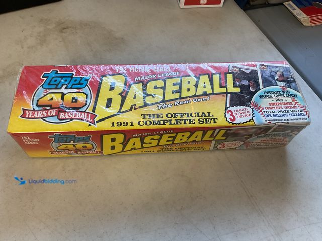 Lot 49-1505423 - COLLECTIBLE FACTORY SEALED 1991 TOPPS BASEBALL COMPLETE 792 CARD SET INCLUDING NOLAN RYAN AND MORE #...
