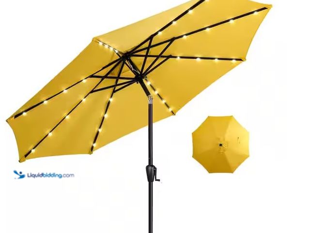 Lot 49-3639282 - Sun-Ray 9 Ft. Steel Market Solar Lighted 8-Rib Round Patio Umbrella in Yellow, Model: 801001Y, Unuse...
