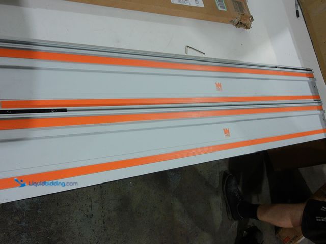 Lot 49-2006050 - WEN 110 in. Track Saw Track Guide Rail and Adapters, Model # CT9110, Slightly used, Has attachments,...