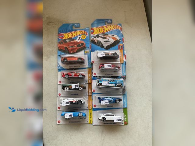 Lot 49-2009035 - Other LOT OF 10 HOT WHEELS NEW IN PACKAGES 1/64 SCALE DIECAST VARIOUS MAKES AND MODELS