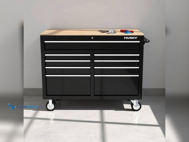 Lot 49-5543162 - Husky
Tool Storage 46 in. W x 18 in. D 9-Drawer Mobile Workbench Cabinet in Gloss Black. Model # H4...