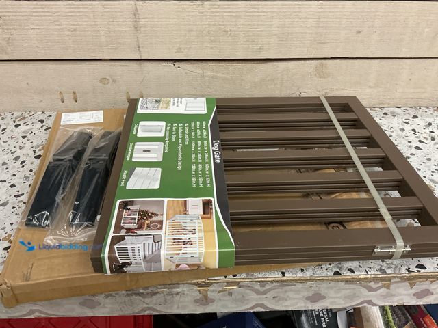 Lot 49-5485956 - Brown dog gate. 60x28 in. Unused with no hardware.