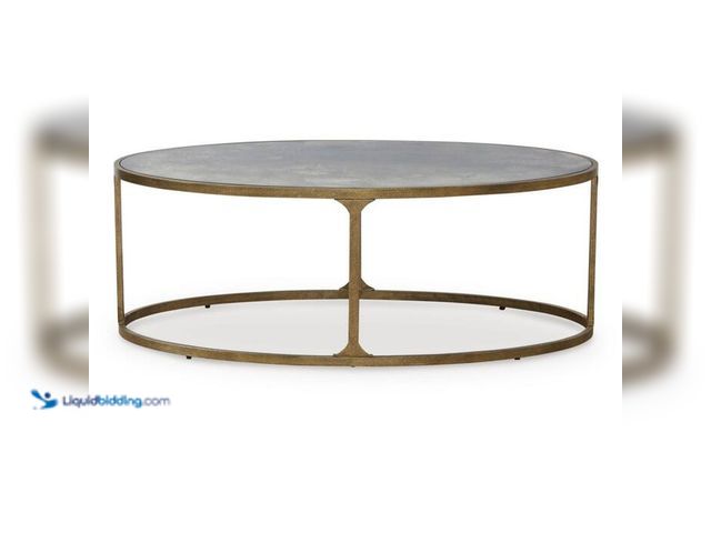 Lot 49-2000701 - Signature DESIGN BY ASHLEY Korajane 48 in. Gold/Gray Oval Faux Marble Coffee Table, Model # T399-0, ...
