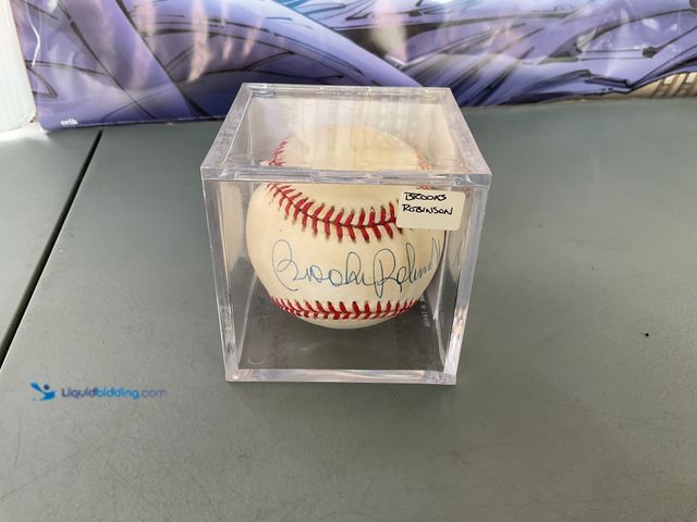 Lot 49-1820854 - COLLECTIBLE AWESOME BALTIMORE ORIOLES AUTOGRAPHED OFFICIAL MLB BASEBALL BY BROOKS ROBINSON . WITH JS...