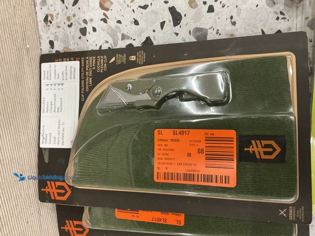 Lot 49-3539939 - Gerber E.A.B Poacket Knife. (Green) With a green beanie. New