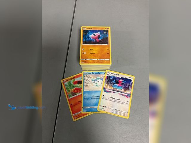Lot 49-1505389 - COLLECTIBLE AMAZING LOT OF 100+ COMMON POKEMON CARDS FROM VARIOUS YEARS AND TYPES. AWESOME LOT FOR A...
