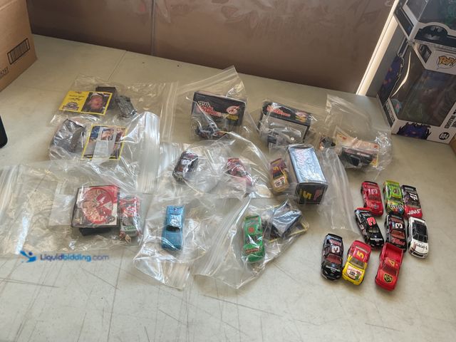 Lot 49-5451677 - Other LOT OF 20 RACING CHAMPIONS 1/64 SCALE DIECAST CARS VARIOUS MAKES, MODELS AND DRIVERS INCLUDING...