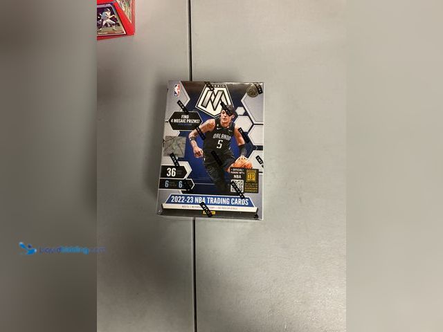 Lot 49-1505381 - COLLECTIBLE FACTORY SEALED 2022-23 MOSAIC NBA BASKETBALL TRADING CARDS COMES WITH 6 PACKS. AMAZING L...