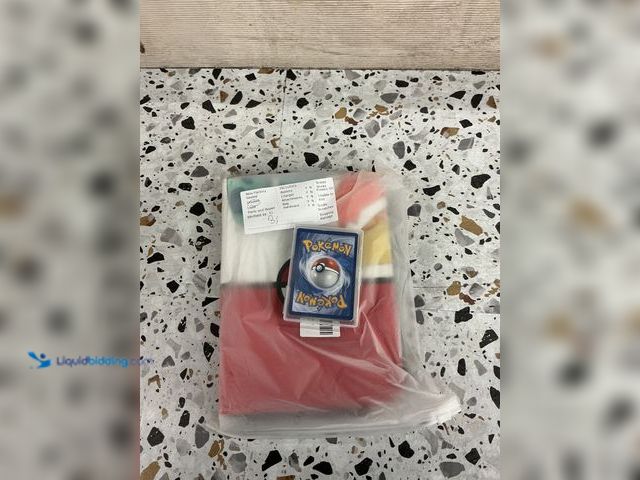 Lot 49-3538923 - Osznmmg trading card binder Pokemon. Comes with mystery assorted Pokemon cards.