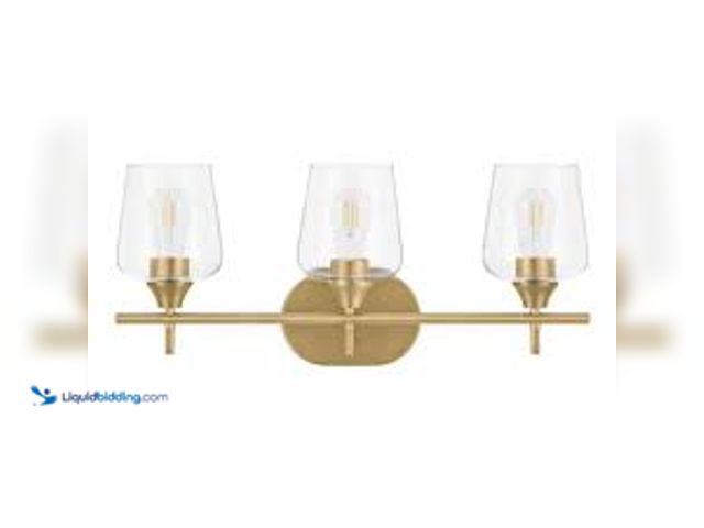 Lot 49-5407110 - Hampton Bay Pavlen 24 in. 3-Lights Antique Brass Vanity Light with Clear Glass Shades. Model # GS-W0...